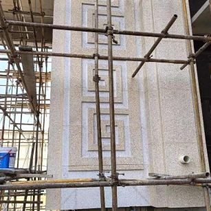 长春 黄金麻花岗岩别墅外墙干挂回纹造型效果