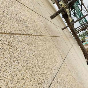 长春 黄金麻花岗岩荔枝面外墙干挂石材效果示例