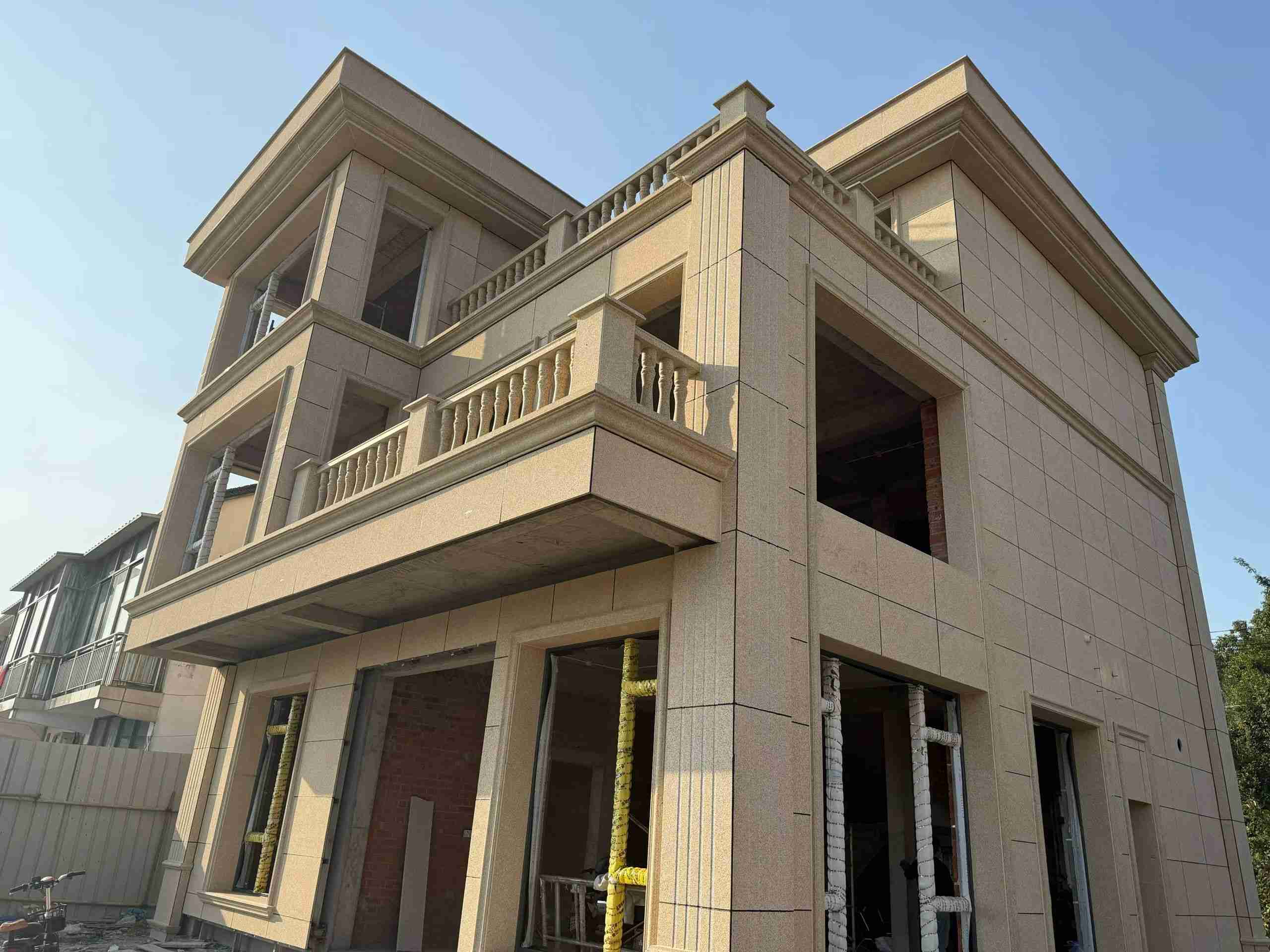 长春 黄金麻花岗岩石材荔枝面外墙干挂效果展示