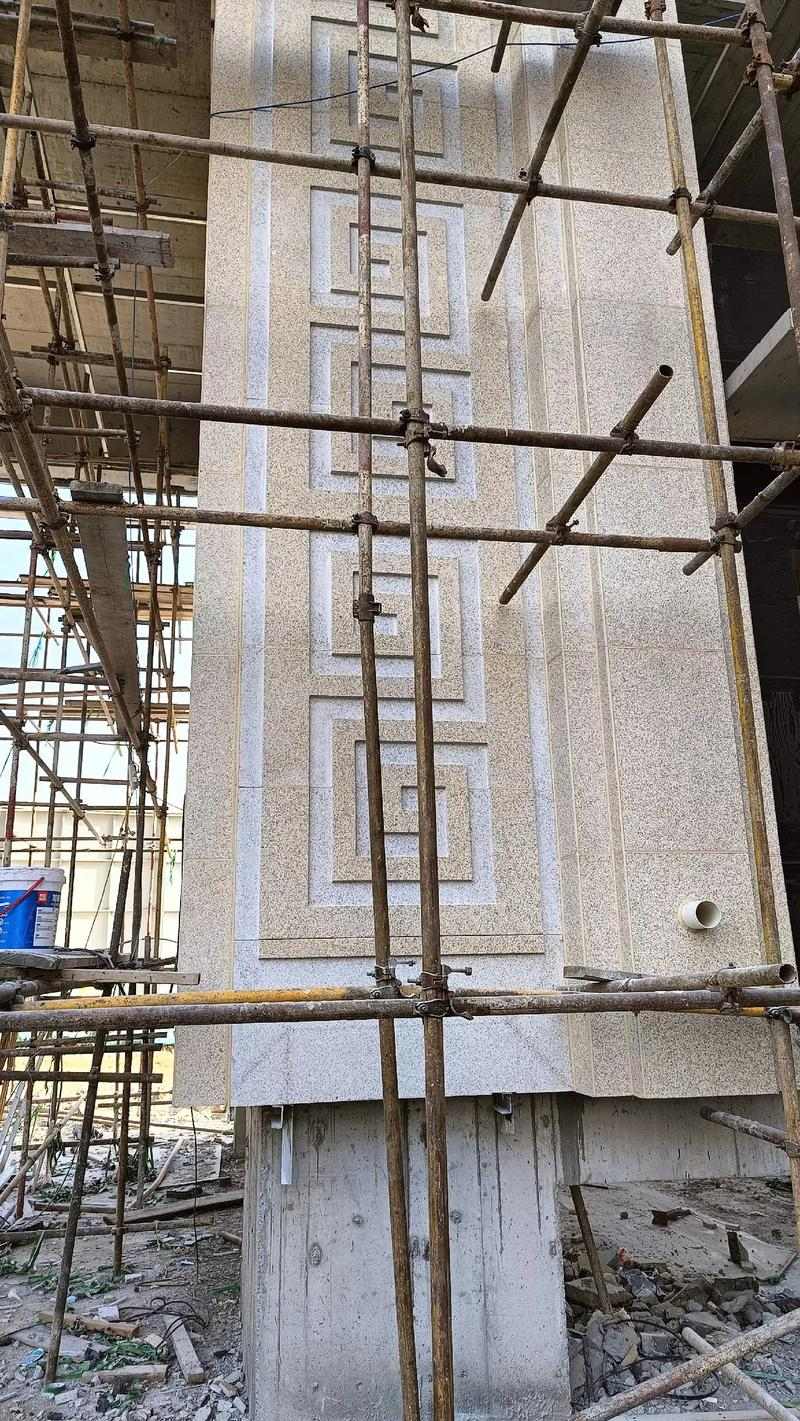 长春 黄金麻花岗岩别墅外墙干挂回纹造型效果