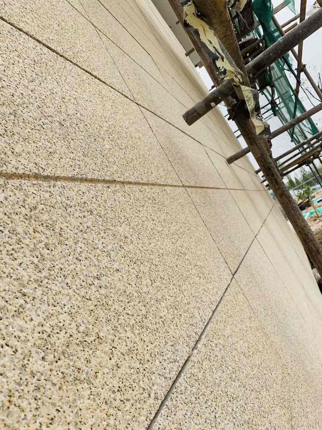 长春 黄金麻花岗岩荔枝面外墙干挂石材效果示例